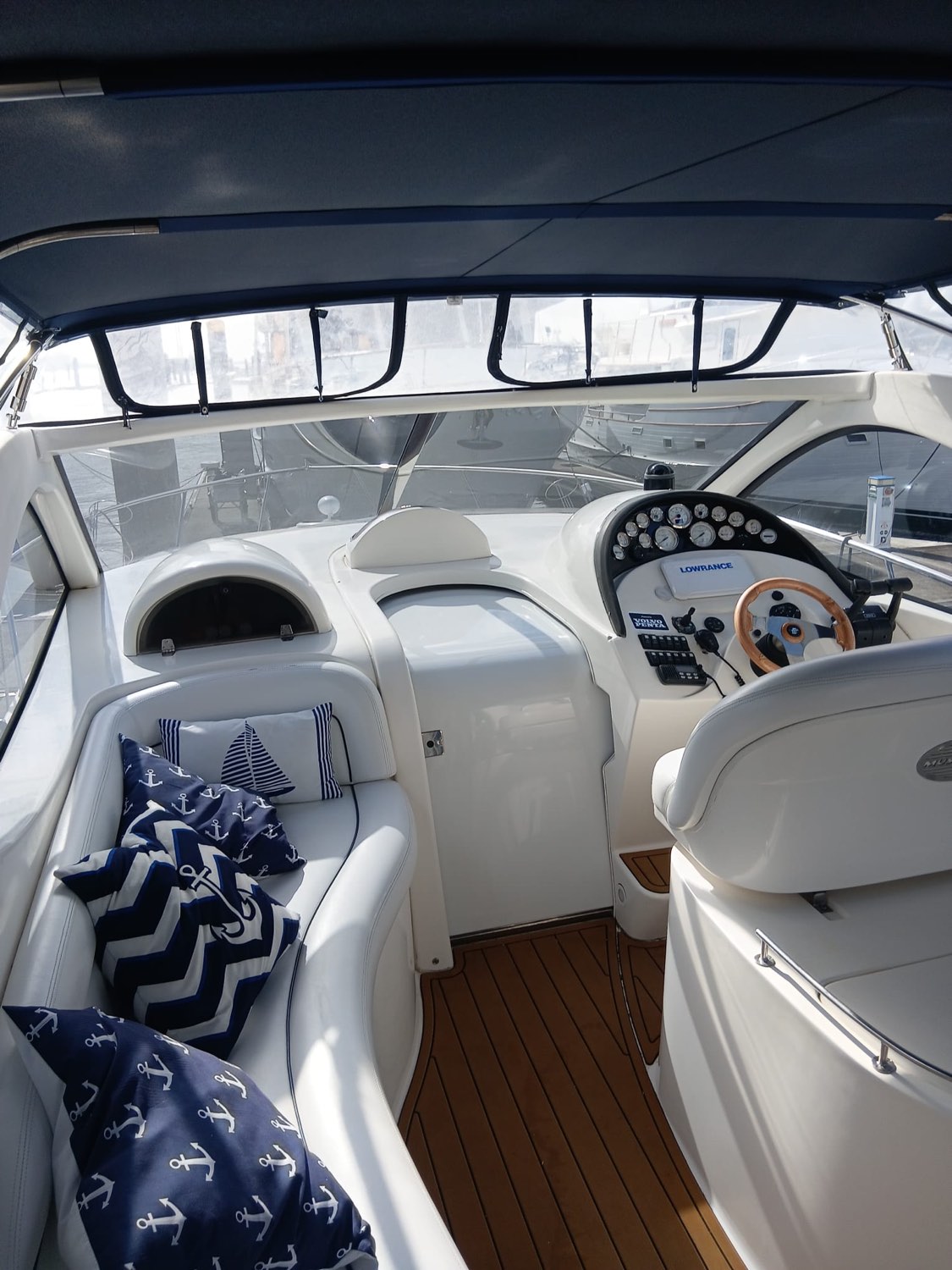 Cruiser cockpit upholstery and teak decking cleaned and protected