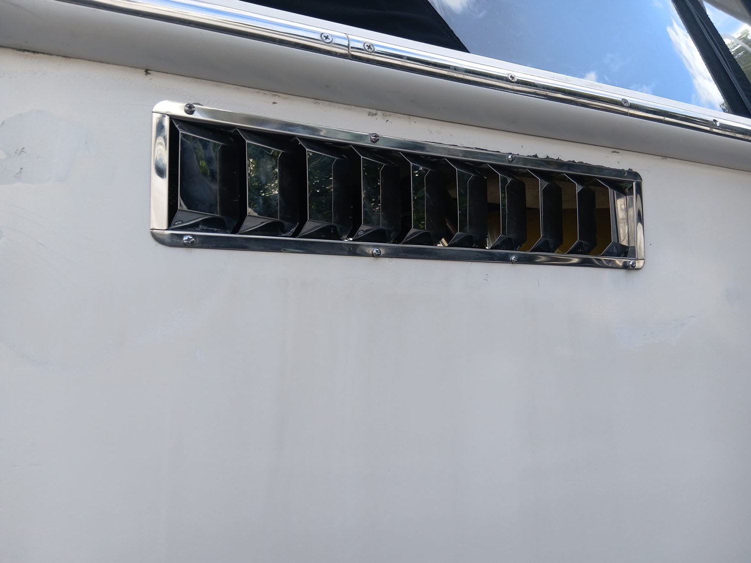 The same stainless steel vent restored to a mirror finish and sealed against corrosion